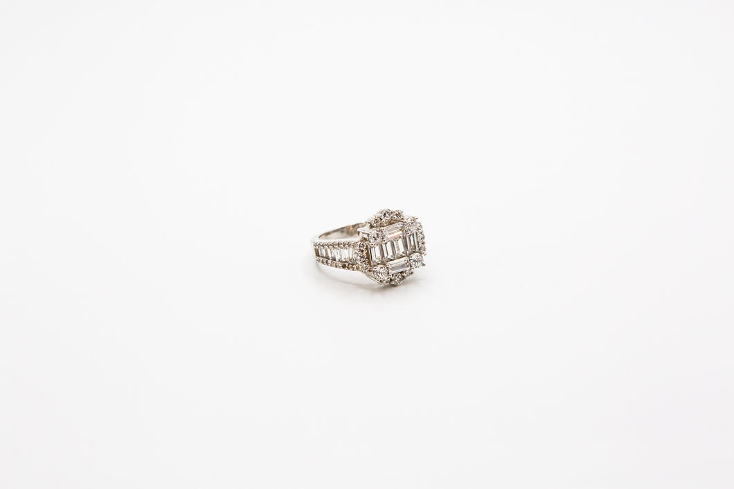 Sterling silver ring with emerald and pave stones