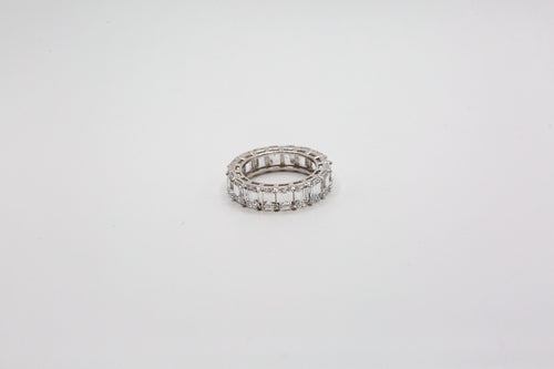 Emerald cut eternity band ring set in sterling silver