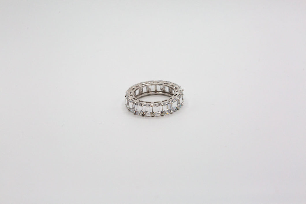 Emerald cut eternity band ring set in sterling silver