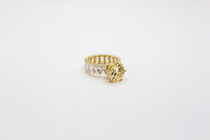Gold ring with Canary yellow stone and emerald cut band