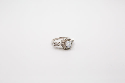 Sterling silver ring with emerald cut stone