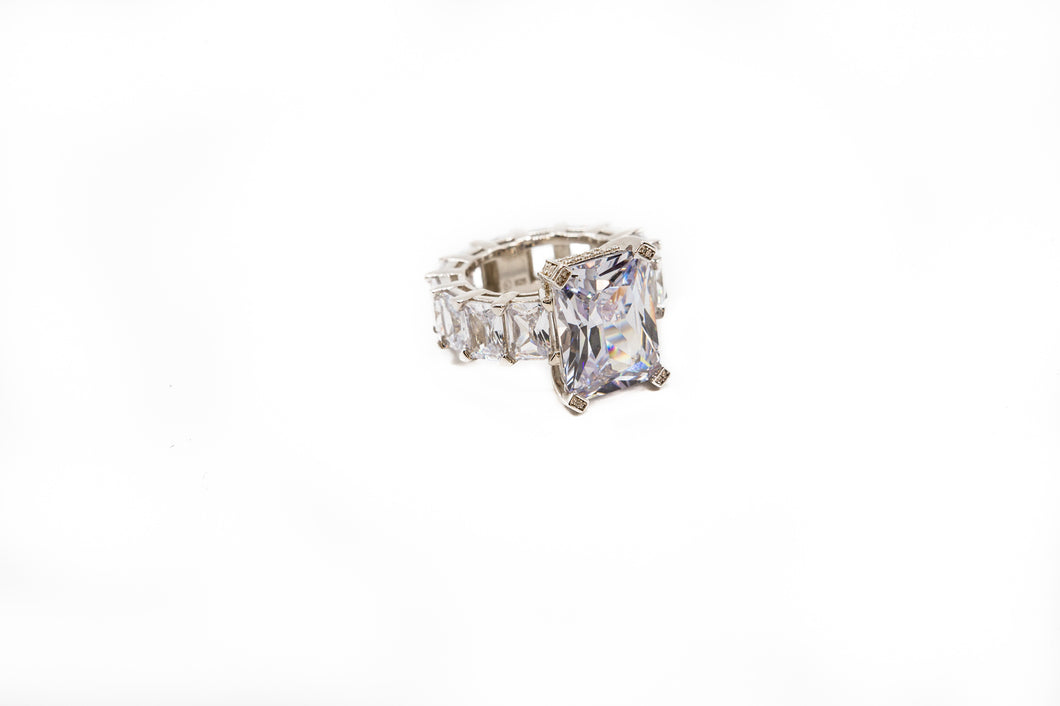 Emerald cut eternity band ring